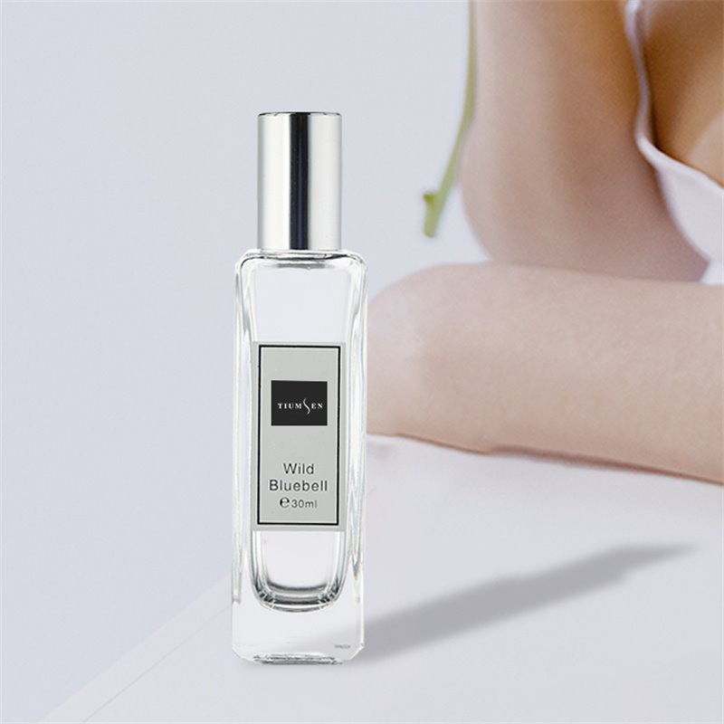 perfume with a rose on the bottle